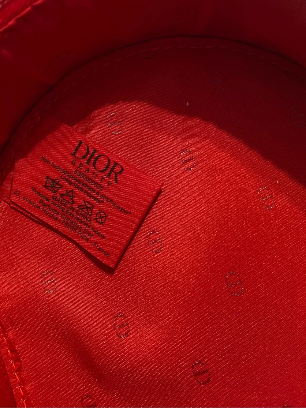 Dior Glossy Red Embossed Oval Cosmetic Case